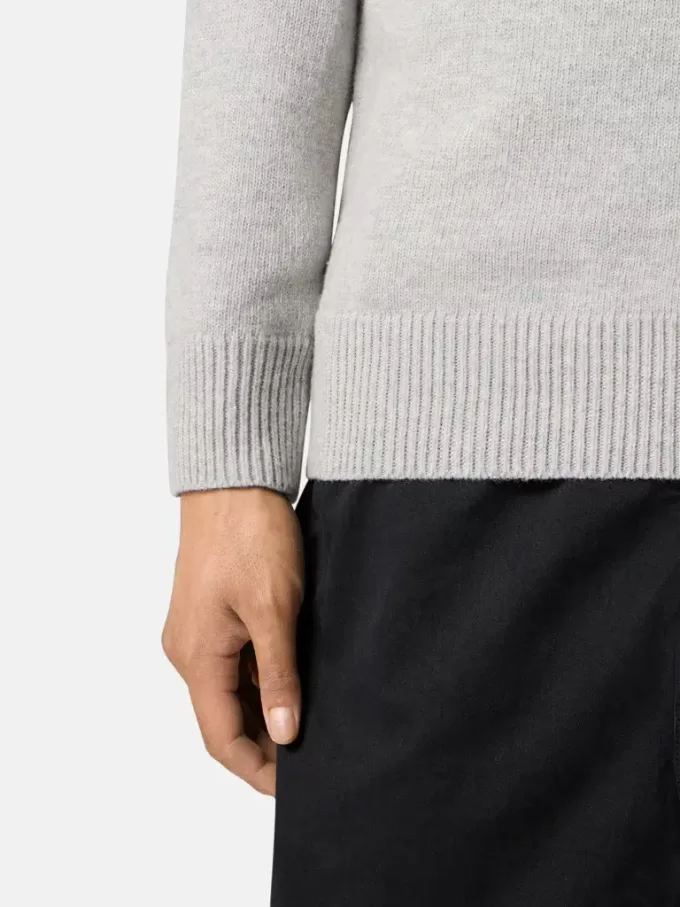 Halv-lynlås sweater med filtkanter