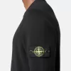 Rullekravesweater med små rullede detaljer