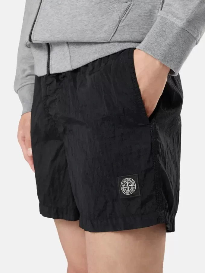 Slim-fit korte badeshorts med lommer